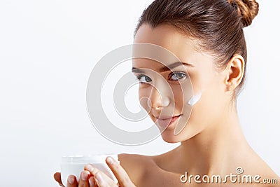 Beauty Concept. Taking good care of her skin. Attractive young woman looking at camera Stock Photo