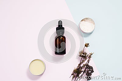 Beauty cosmetic skin care cream serum background. Products with dried flower, leaves on table top view, flat lay. minimal modern. Stock Photo