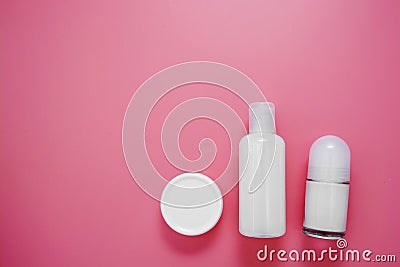 Beauty, cosmetics, hygiene products on pink background with copy space, flat lay skin care concept Stock Photo