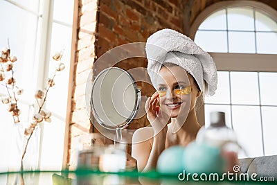 Beauty Day. Woman doing her daily skincare routine at home Stock Photo