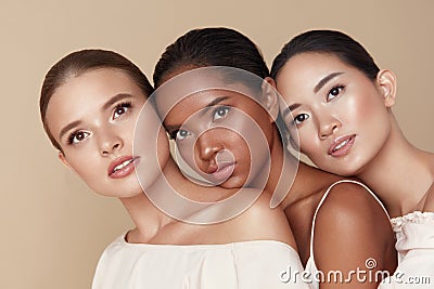 Beauty. Diversity Group Of Models Portrait. Multicultural Women With Nude Makeup And Smooth Perfect Skin. Stock Photo