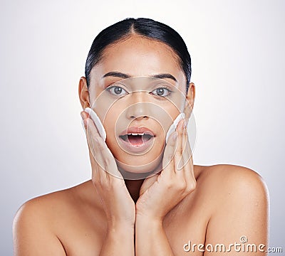 Beauty, face and clean cotton on skin of woman in studio for natural dermatology and cosmetics. Female person with a Stock Photo