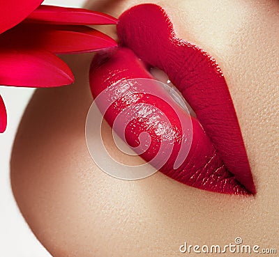 Beauty face closeup. lips. Beauty red lip makeup detail. Beautiful make-up close-up Stock Photo