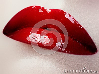 Beauty face closeup. lips. Beauty red lip makeup detail. Beautiful make-up close-up Stock Photo