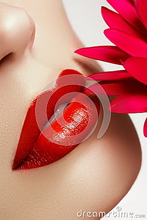Beauty face closeup. lips. Beauty red lip makeup detail. Beautiful make-up close-up Stock Photo