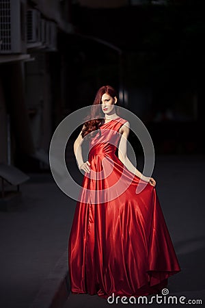 Beauty Famous Woman In Red Dress Outdoor Stock Photo