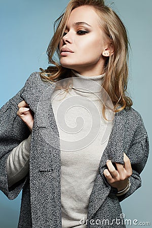 Beauty Fashion blonde Girl in topcoat Stock Photo