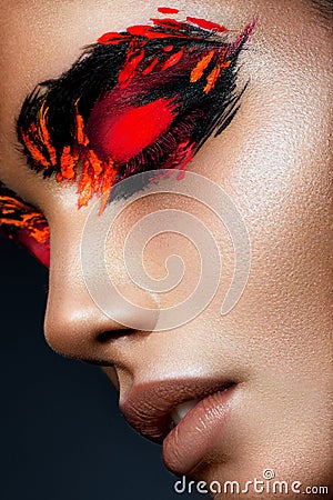Beauty fashion model girl with dark bright orange make-up Stock Photo