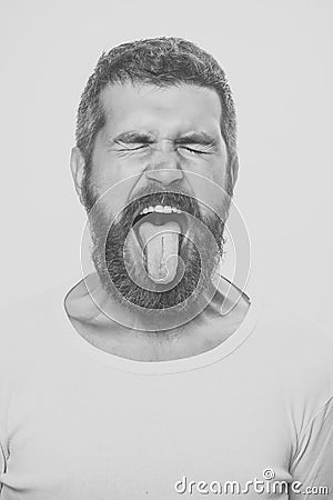 Beauty Fashion model man. Fashion look. man with long beard with closed eyes and tongue Stock Photo