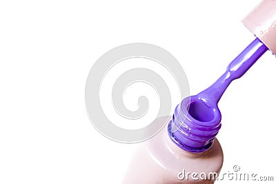 Beauty, fashion and Nail art concept. Manicure at salon - close-up bottle and brush of purple gel nail polish. on white b Stock Photo