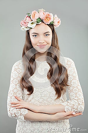 Beauty Fashion Portrait of Beautiful Model Woman in White Lacy Dress and Flowers Wreath Stock Photo