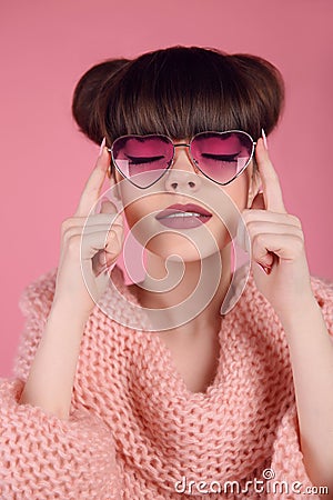 Beauty Fashion teen girl model in heart sunglasses. Portrait of Stock Photo