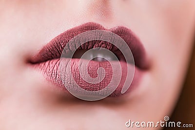 Beauty Fashion woman lips with natural Makeup. Matte lipstick. Beauty girl face close up. Nude Colors. lips Stock Photo