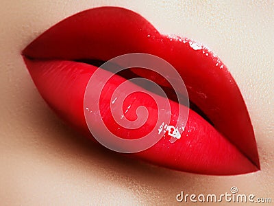 Beauty female face. Professional glossy lip makeup. Pink lip gloss and lipstick Stock Photo