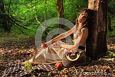 Beauty in forest with red apples Stock Photo