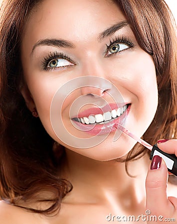 Beauty Girl Applying Lipgloss Stock Photo