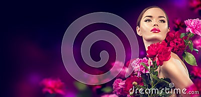 Beauty girl with purple, red, pink peony flowers portrait. Beauty high fashion model woman with peony flowers Stock Photo