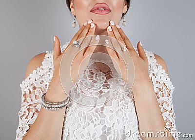 Beauty jewelry and luxury concept - close up of beautiful. Woman bracelet and rings Stock Photo