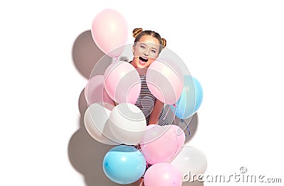 Beauty joyful teenage girl with colorful air balloons having fun Stock Photo