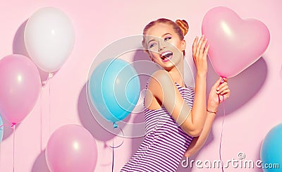 Beauty joyful teenage girl with colorful air balloons having fun Stock Photo