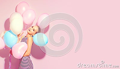 Beauty joyful teenage girl with colorful air balloons having fun Stock Photo