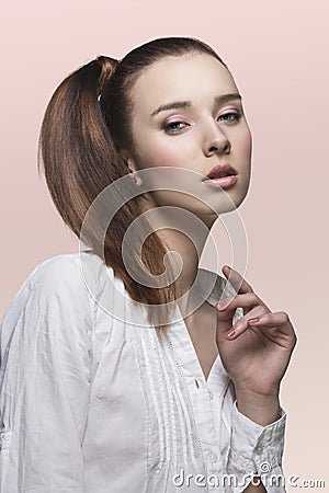 Beauty lady with smooth ponytail Stock Photo