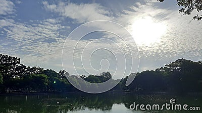 the beauty of the lake with the sunrise shining with clouds Stock Photo