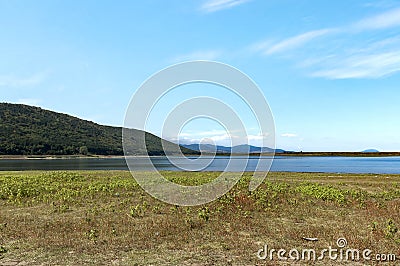Beauty look toward picturesque Rabisha lake and mountain over Magura cave Stock Photo