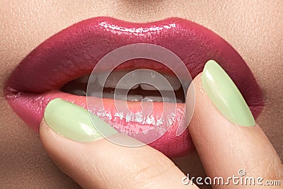 Beauty macro make-up with bright mint green color on nails Stock Photo