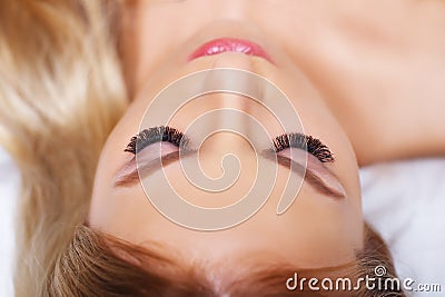 Beauty makeup for blue eyes. Part of beautiful face closeup. Perfect skin, long eyelashes, make up concept. Stock Photo