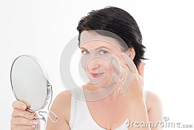 Beauty middle age woman with mirror. Face portrait. Spa and anti aging concept Isolated on white background. Plastic surgery Stock Photo