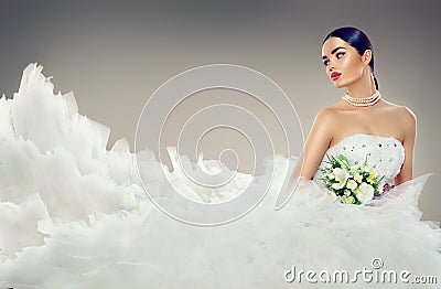 Beauty model bride in wedding dress with long train Stock Photo