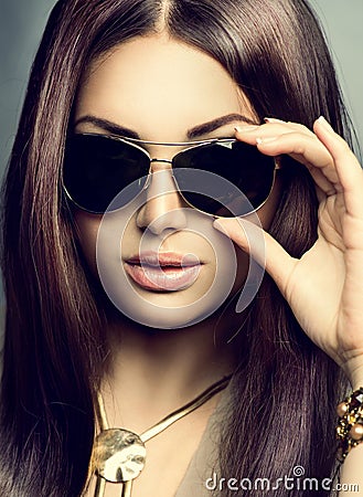 Beauty model girl wearing sunglasses Stock Photo