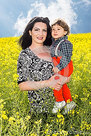 Beauty mother and toddler son in nature Stock Photo