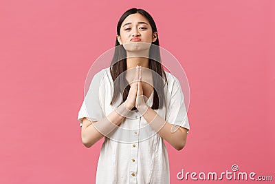 Beauty, people emotions and summer leisure concept. Cute and needy hopeful asian girlfriend asking for favour, pleading Stock Photo