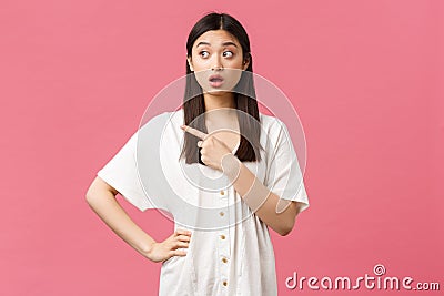 Beauty, people emotions and summer leisure and vacation concept. Confused asian girl looking puzzled and unsure Stock Photo