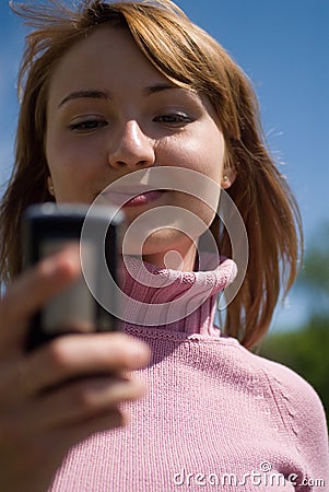 Beauty and the phone Stock Photo