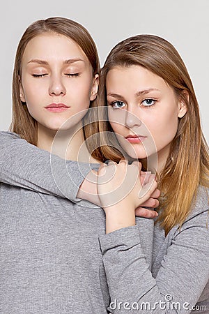 Beauty portrait of twins sisters Stock Photo