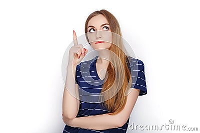 Beauty portrait of young adorable fresh looking blonde woman in blue t shirt. Emotion and facial expression concept. Stock Photo