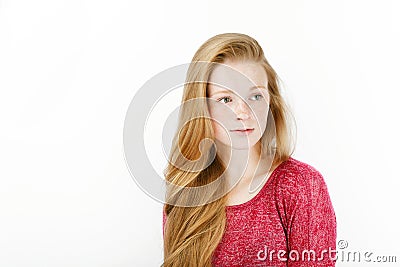 Beauty portrait of young adorable fresh looking redhead woman with gorgeous extra long hair. Emotion and facial expression concept Stock Photo