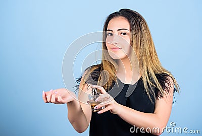 Beauty product. Scented water concept. Spray perfume on pulse points. Sophisticated olfactory hit. Pretty woman with Stock Photo