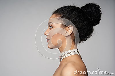 Beauty profile portrait of beautiful mixed race woman wearing chocker Stock Photo