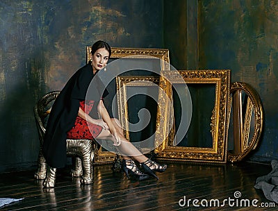 Beauty rich brunette woman in luxury interior near Stock Photo