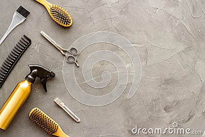 Beauty saloon concept. Hairdresser accessories pattern on grey stone background top-down frame copy space Stock Photo