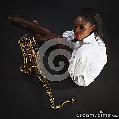 Beauty with Sax Stock Photo