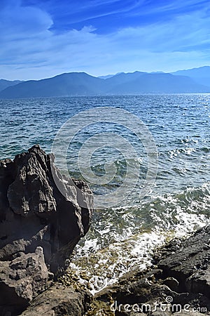 The beauty of the sea and nature on a rocky beach Stock Photo