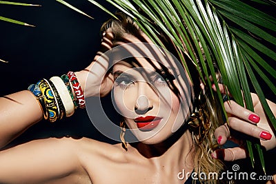 Beauty woman makeup jungle palm sun tan shadows beach Stock Photo