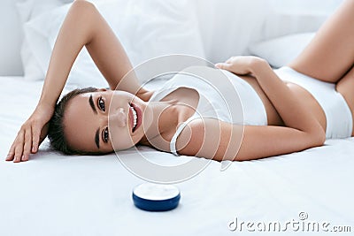 Beauty Skin Care. Woman With Beautiful Soft Skin And Body Cream Stock Photo