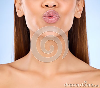 Beauty, skincare and lips kiss with a model pout with lip gloss makeup in studio. Cosmetic, mouth and healthy natural Stock Photo