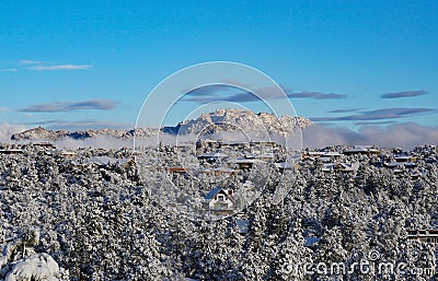 The Beauty of a Snow Covered Granite Mountain Stock Photo